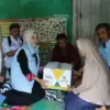 Ikhlas membantu warga darma.