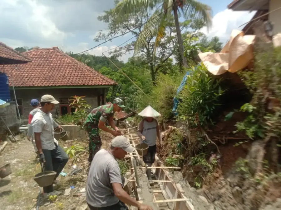 Bangun saluran irigasi